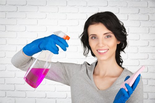 Staff using carpet cleaning equipment with caution